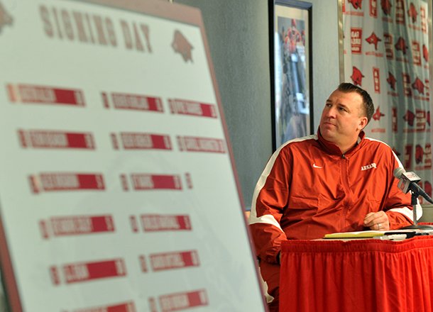 University of Arkansas head football coach Bret Bielema talks about the 22 players who committed to the Razorbacks as he conducts a press conference Wednesday afternoon in Fayetteville. 