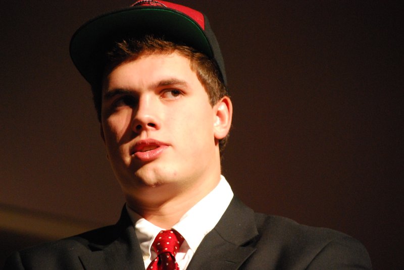 Pulaski Academy tight end Hunter Henry committed to Arkansas in a Monday afternoon ceremony at the school.