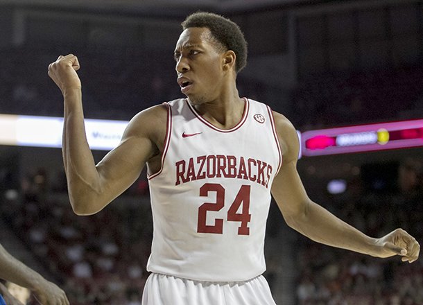 Arkansas' Michael Qualls argues a call during the first half an NCAA college basketball game against Florida in Fayetteville, Ark., Tuesday Feb. 5, 2013. (AP Photo/Gareth Patterson)