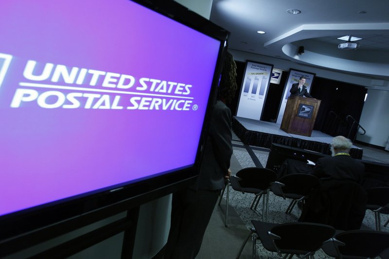 Postmaster General and CEO Patrick R. Donahoe speaks during a news conference at U.S. Postal Service headquarters on Wednesday Feb. 6, 2013 in Washington.