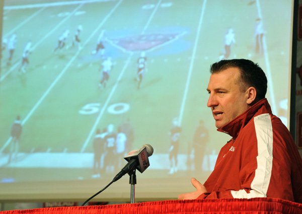 Bret Bielema, Arkansas head football coach, talks about the 22 players who committed to the Razorbacks as he conducts a news conference Wednesday afternoon in Fayetteville. 