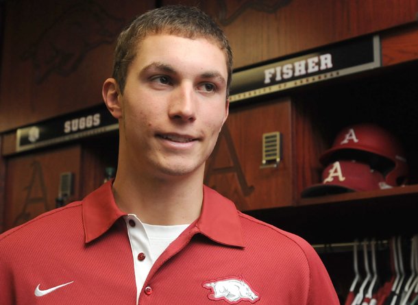 Arkansas redshirt sophomore Eric Fisher talks to the media Friday, Feb. 8, 2013 at Baum Stadium in Fayetteville. Fisher will likely start at first base Friday when the No. 1 Razorbacks host Western Illinois.