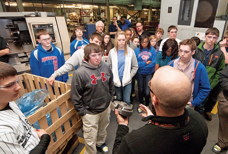 Students from Arkadelphia High School tour the Danfoss factory, which makes air-conditionong compressors. New Tech students from the school are collaborating with the facility to learn the process of manufacturing products.
