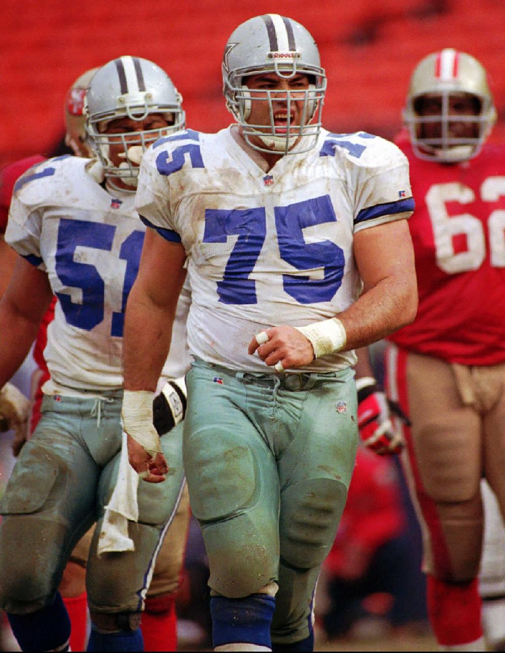 Dallas Cowboys defensive tackle Tony Casillas pauses during the