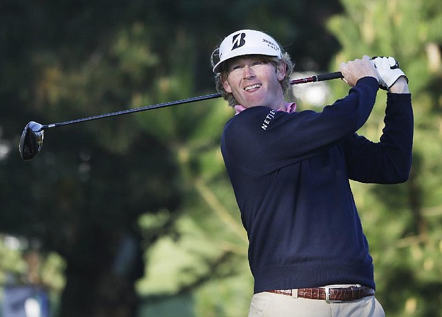 PGA Tour golfer Brandt Snedeker (above) ran off four consecutive birdies Saturday at Pebble Beach for a 4-under-par 68 that gave him a share of the third-round lead with rookie James Hahn. 
