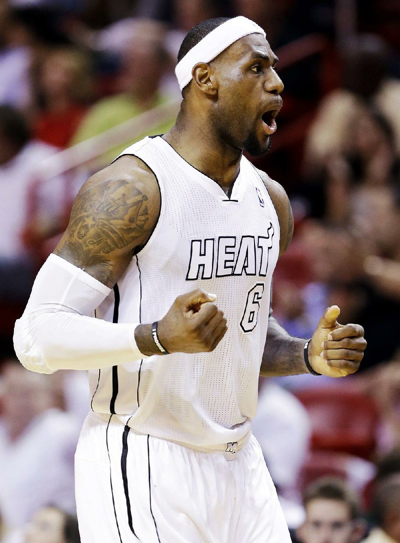 Miami forward LeBron James scored 32 points in the Heat’s 107-97 victory over the Los Angeles Lakers on Sunday. 