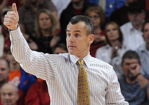 Florida's Billy Donovan, head coach, gives a thumbs up to players Tuesday, Feb. 5, 2013, at Bud Walton Arena in Fayetteville. The Gators were one of the four, top-five teams to be upset last week.