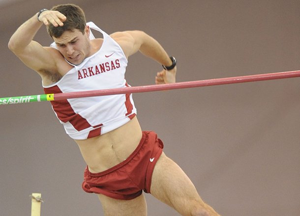 NWA Media/ANDY SHUPE
Arkansas junior Kevin Lazas clears a height during the pole vault Saturday, Feb. 9, 2013, during the Tyson Invitational at the Randal Tyson Track Center in Fayetteville.