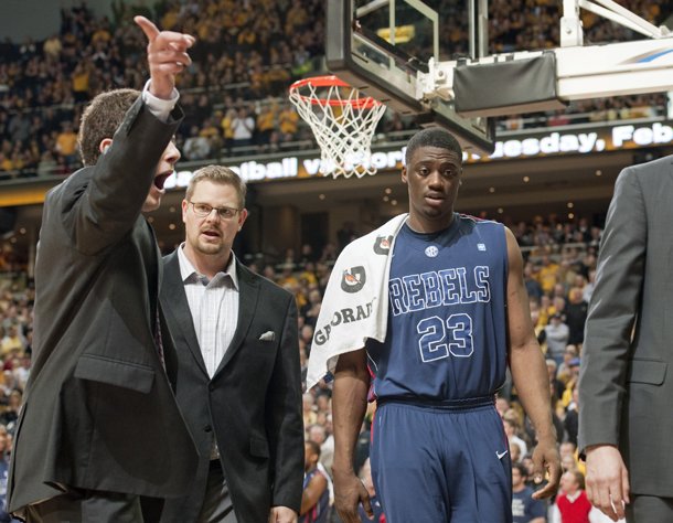 Mississippi's Reginald Buckner, right, is escorted off the court after being ejected during the second half of an NCAA college basketball game against Missouri on Saturday, Feb. 9, 2013, in Columbia, Mo. Missouri won 98-79. (AP Photo/L.G. Patterson)