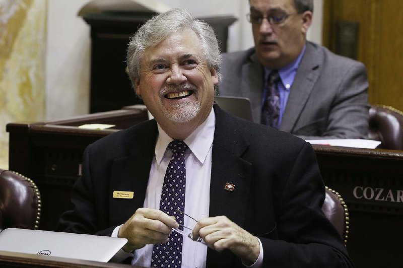 Rep. Mark Lowery, R-Maumelle, watches the vote total on a Senate bill he is sponsoring in the House chamber at the state Capitol on Monday. The bill requiring a study of readiness of public school systems to prevent and respond to acts of violence passed in the House. 