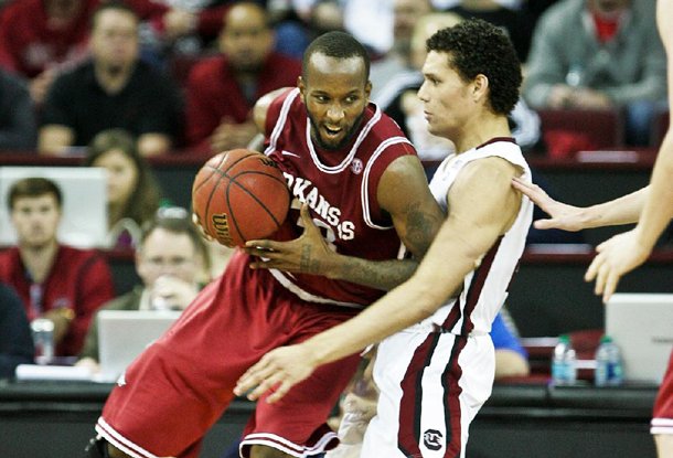 Marshawn Powell (left) has struggled to stay out of foul trouble in road games this season.