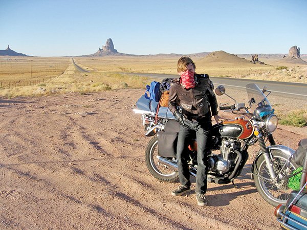 Trevor Ware and his Honda on the side of the highway in northeastern Arizona.