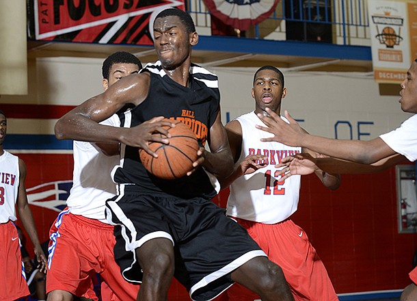 Hall's Bobby Portis spins around as he moves for the basket during the Hall-Parkview game held Tuesday night at Parkview High School.