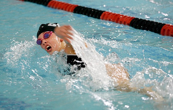 Bentonville’s Alexa Tininenko competes in the 100 freestyle on Jan. 31 during the Bentonville Invitational Meet. 