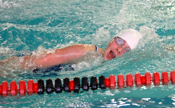 Rogers’ Lisa Lauschke swims in the 200 freestyle on Jan. 31 during the Bentonville Invitational Meet inside The Jones Center in Springdale.
