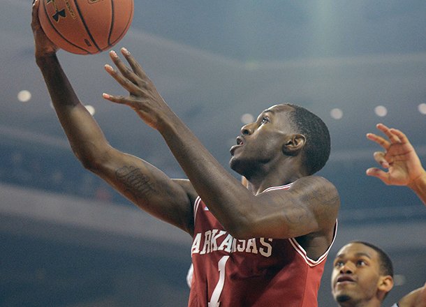 Arkansas' Mardracus Wade (1) scores against Auburn during an NCAA college basketball game on Wednesday, Feb. 13, 2013, at Auburn Arena in Auburn, Ala. (AP Photo/al.com, Julie Bennett)