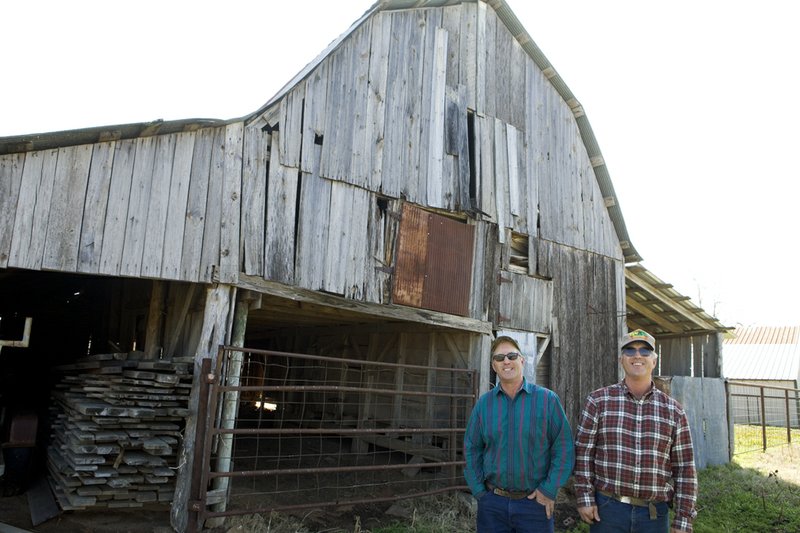 The Lucas Farm, owned by identical twins Terry, left, and Gary Lucas, was recently named a Century Farm, which means it has been farmed by the same family for more than 100 years.