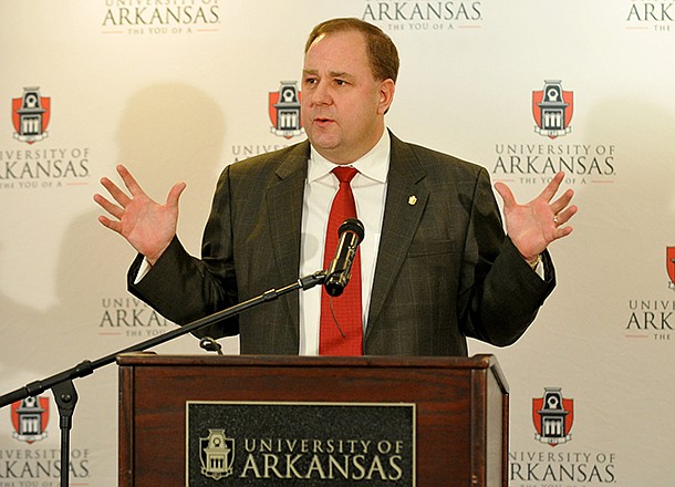 University of Arkansas Senior Associate Athletic Director of Development Chris Wyrick speaks during a press conference Wednesday morning in Fayetteville. 