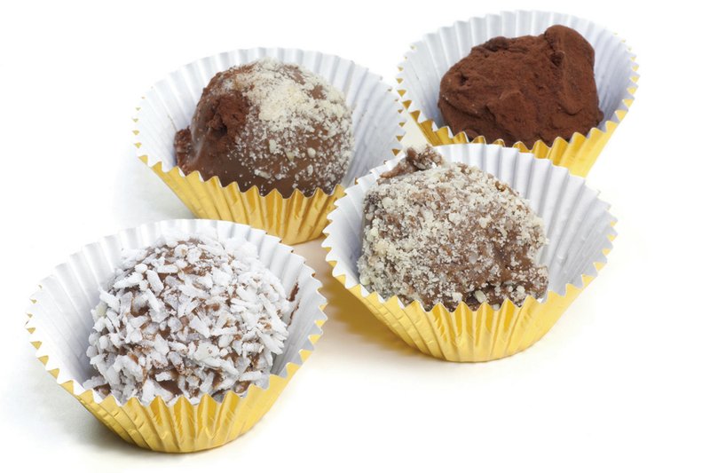 Coat Homemade Chocolate Truffles with cocoa powder or confectioners’ sugar to finish off these sweet treats.