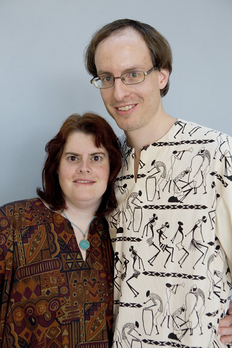 Mary Ann and Josh Fisher met through an online dating website and have been married for seven years. The couple honeymooned in South Africa and purchased African-style clothing while they were there.