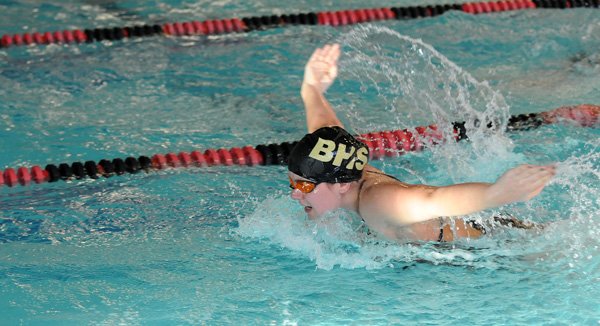 Logan Smith of Bentonville swims the fly in the 200-yard individual medley Wednesday during the NWA Conference swim meet at The Jones Center in Springdale. 