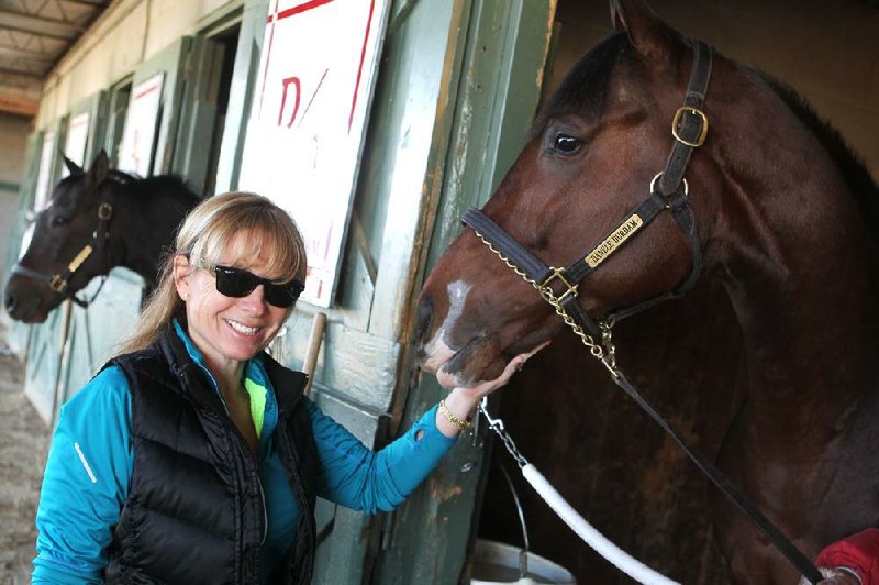 Danele Durham began training thoroughbreds in the 1980s, then quit training in 1993-2006 to raise her son. 