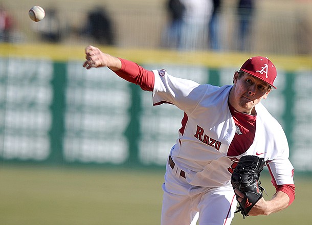 Arkansas pitcher Ryne Stanek fires a pitch in the first inning of Friday afternoon's season opener against Western Illinois at Baum Stadium in Fayetteville. 
