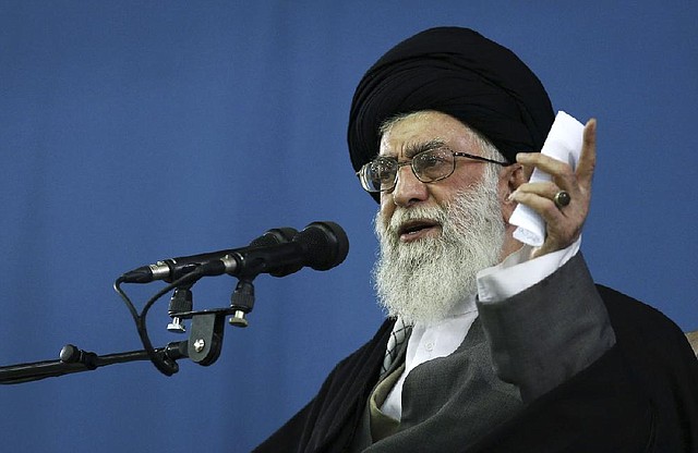 In this photo released by an official website of the Iranian supreme leader's office, Supreme Leader Ayatollah Ali Khamenei, speaks to the crowd in Tehran, Iran, Saturday, Feb. 16, 2013. Iran's Supreme Leader said Saturday that his country is not seeking nuclear weapons, but that no world power could stop Tehran's access to an atomic bomb if it intended to build one. (AP Photo/Office of the Supreme Leader)