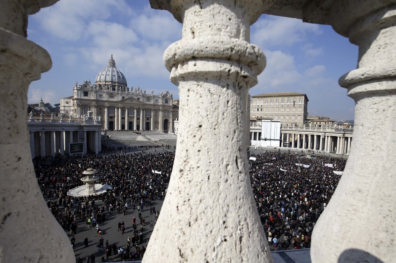 Faithful gather to listen to pope Benedict XVI's Angelus prayer in St. Peter's square at the Vatican, Sunday, Feb. 17, 2013. Pope Benedict XVI blessed the faithful from his window overlooking St. Peter's Square for the first time since announcing his resignation, cheered by an emotional crowd of tens of thousands of well-wishers from around the world.