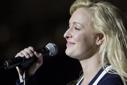 In this undated file photo, country singer Mindy McCready performs in Nashville, Tenn. McCready, who hit the top of the country charts before personal problems sidetracked her career, died Sunday, Feb. 17, 2013. She was 37.