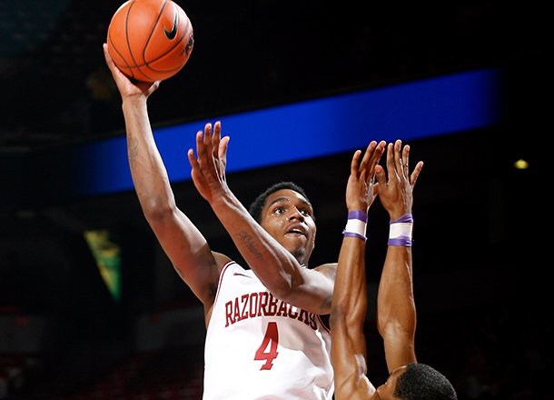 Coty Clarke will be on the Razorbacks' white team on Sunday, featuring only out-of-state players.