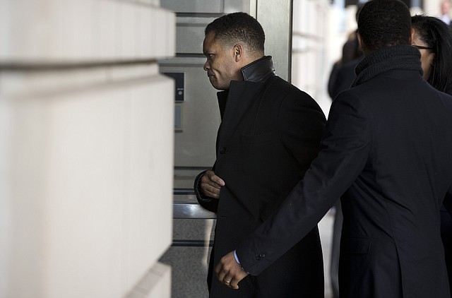 Former Illinois Rep. Jesse Jackson Jr. arrives at the E. Barrett Prettyman Federal Courthouse in Washington, Wednesday, Feb. 20, 2013. Jackson and his wife were to appear in federal court to answer criminal charges that they engaged in an alleged scheme to spend $750,000 in campaign funds on personal items. 