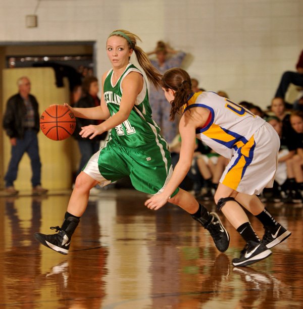 Greenland’s Anna Rogers tries to get past Cedarville defender Allie Arnold during Friday’s finals in the girls 3A-1 West District Tournament at West Fork.