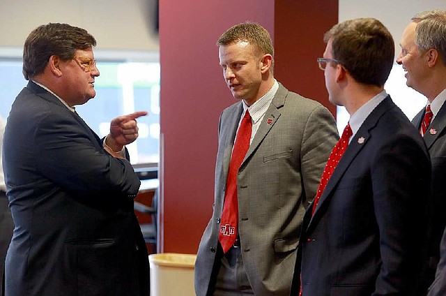 
Kevin Crass, Chairman of the War Memorial Stadium Commission, left, talks with ASU football coach Bryan Harsin during an ASU athletics department press conference at the stadium Wednesday afternoon.