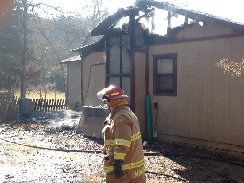 The scene of a house fire Friday near Goshen.