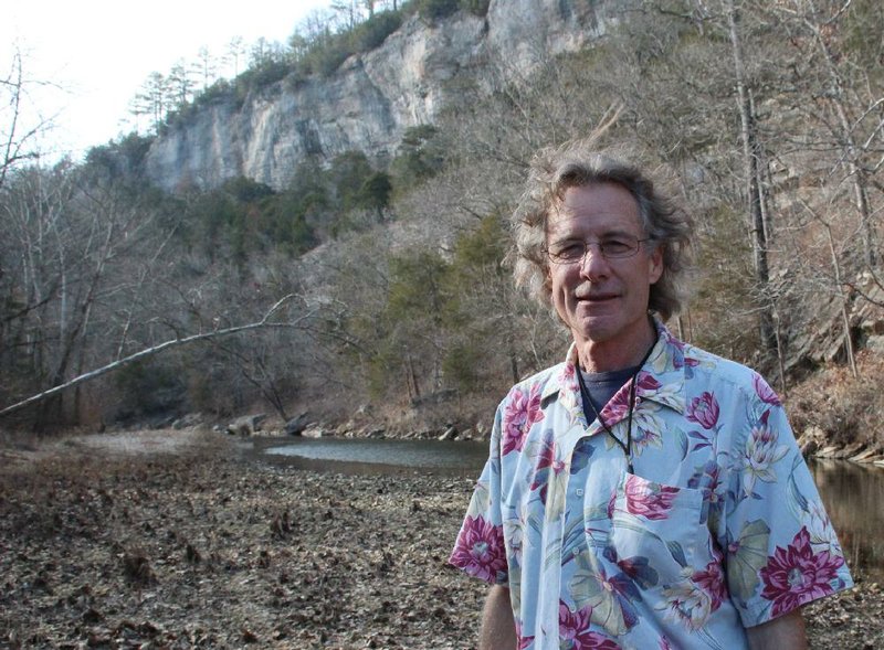 The bluffs along Cave Creek in Newton County were home to Arkansas' indigenous peoples thousands of years before art conservator Wendel Norton's own great-great-grandfather settled at Bass after the Civil War. Norton enjoys balmy weather Jan. 28, 2013.
