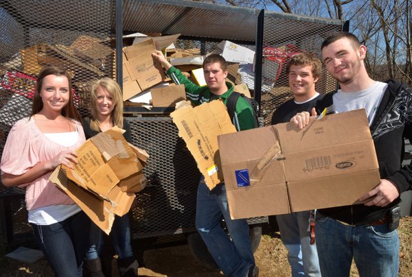 Greenland High School students Morgan Miller, from left, Emily Sherer, Tylor McClannahan, Seth Partain and Evan Johnson led a recycling competition that resulted in being first in Arkansas and 117th nationally out of 900 schools competing. 