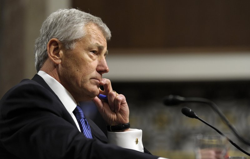 FILE - In this Jan. 31, 2013 file photo, former Nebraska Republican Sen. Chuck Hagel, President Obama's choice for defense secretary, testifies before the Senate Armed Services Committee during his confirmation hearing on Capitol Hill in Washington.