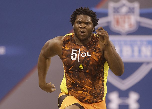 Arkansas offensive lineman Alvin Bailey goes through a drill during the NFL Combine in Indianapolis Saturday, Feb. 23, 2013. (AP Photo/Dave Martin)