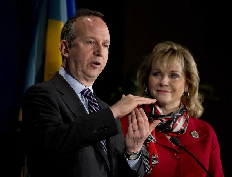 National Governors Association Chairman Gov. Jack Markell of Delaware, left, with Vice Chariman Gov. Mary Fallin of Oklahoma speaks during a news conference at the NGA Winter Meeting in Washington, Saturday, Feb. 23, 2013. The nation's governors say their states are threatened if the automatic, across-the-board budget cuts known as the sequester take effect March 1.  (AP Photo/Manuel Balce Ceneta)