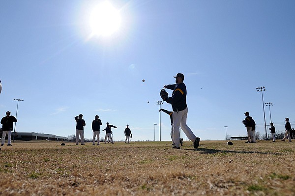 Ecclesia College players practice Feb. 19 at the Tyson Sports Complex in Springdale. The baseball team originally started as a club sport, but has since moved to a college program.