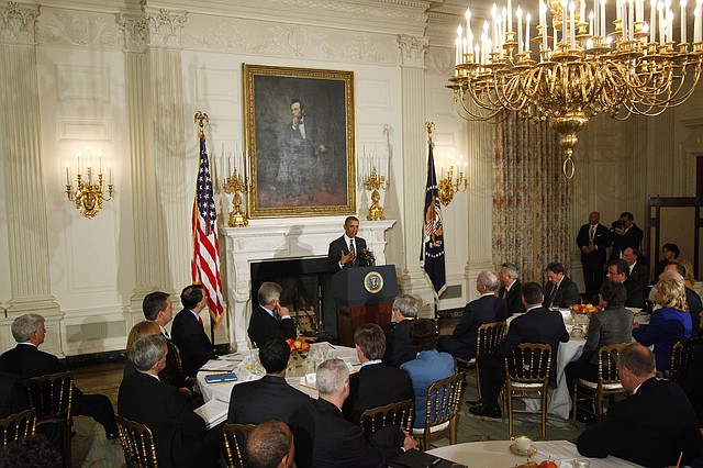 President Barack Obama addresses the National Governors Association, including Arkansas Gov. Mike Beebe (on Obama’s right), in the State Dining Room of the White House in Washington on Monday. 
