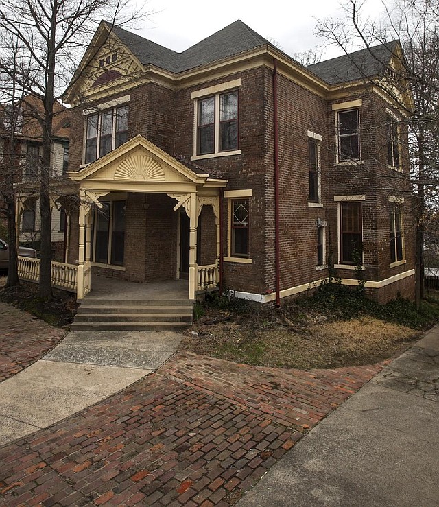 
The 1891 Bruner House at 1415 Cantrell Rd, which is on the National Register of Historic Properties, will be torn down in the coming weeks. An Alabama salvage company is rescuing the mantels, rails, flooring and other features of the Eastlake-design house. The house, a carriage house in the rear, and a house next door, which will also come down, were bought for $500,000 in April 2011, according to Pulaski County assessor records. No demolition permits have been taken out, but according to the salvage company Southern Accents, noe are need for architectural salvage.