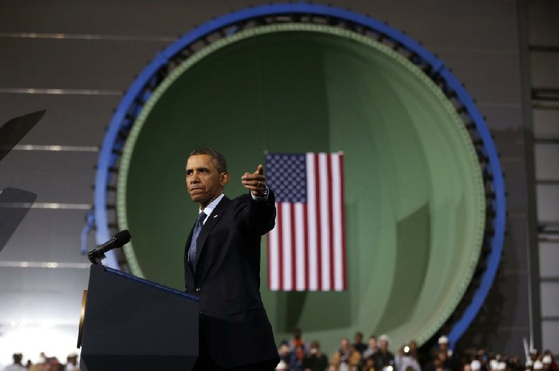 President Barack Obama gestures as he speaks about automatic defense budget cuts during a visit to Newport News Shipbuilding, a division of Huntington Ingalls Industries, Tuesday, Feb. 26, 2013, in Newport News, Va. (AP Photo/Charles Dharapak)