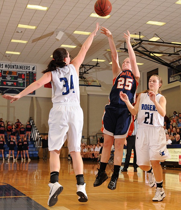 Lacey Murray, center, of Rogers Heritage and the Lady War Eagles combined for 20 wins during Murray’s sophomore and junior years, but could equal that total this season with a win tonight against Fort Smith Southside at the Class 7A State Tournament. 