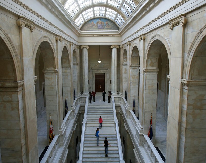 FILE - Visitors to the state Capitol walk up the steps leading to the Senate chamber Jan. 11, 2013.