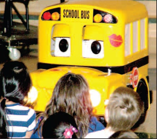 Buster the school bus spoke to students during a bus safety assembly at Gentry Primary School on Friday. The program is designed to teach children, in a memorable way, how to safely board and ride a school bus. Assemblies were held at the Primary and Intermediate Schools. 