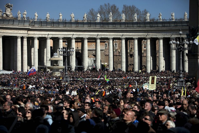 Faithful gather during Pope Benedict XVI's last general audience in St. Peter's Square at the Vatican on Wednesday, Feb. 27, 2013. Benedict XVI basked in an emotional sendoff Wednesday at his final general audience in St. Peter's Square, recalling moments of "joy and light" during his papacy but also times of great difficulty. He also thanked his flock for respecting his decision to retire. 