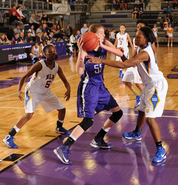 Lauren Schuldt, center, a Fayetteville sophomore forward, pulls down a rebound over North Little Rock junior forward Kiara Webb, right, on Wednesday during the first round of the Class 7A State Basketball Tournament in Fayetteville. 