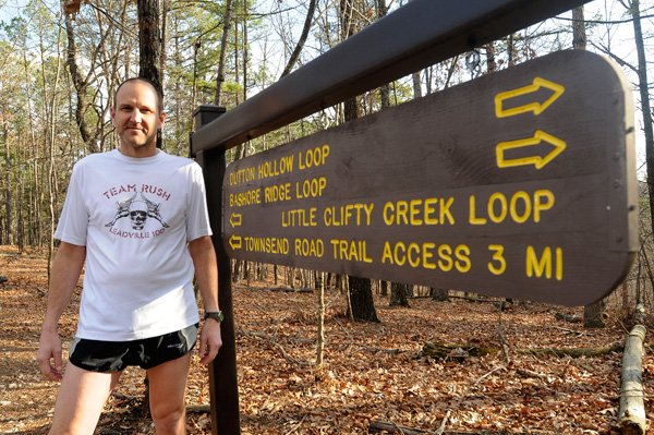 Chris Cantwell gets three times the fitness and fun Jan. 30 at the Hidden Diversity Multiuse Trail at Hobbs State Park-Conservation Area. Cantwell of Little Flock runs, rides his mountain bike and rides horses on the trail that is open for all three activities. 